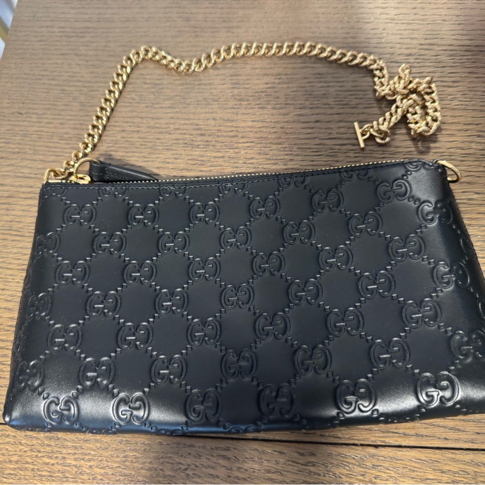 Gucci GG emblem Embossed Clutch with Gold Chain
